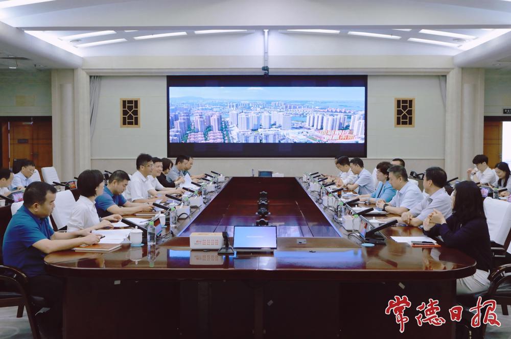 罗毅君与国科控股总经理陈静一行举行工作会谈